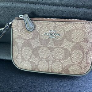 Coach wristlet. Barley used